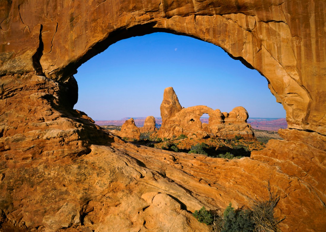 Turret Arch seen from rock opening. Arches National Park, Utah, USA.