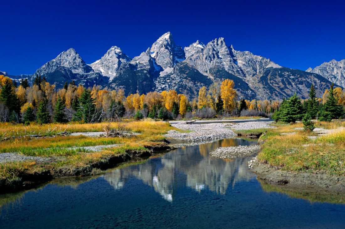 Grand Teton and fall colors reflected at Schwabacher landing. Grand Teton National Park, Wyoming (QT Tuan)